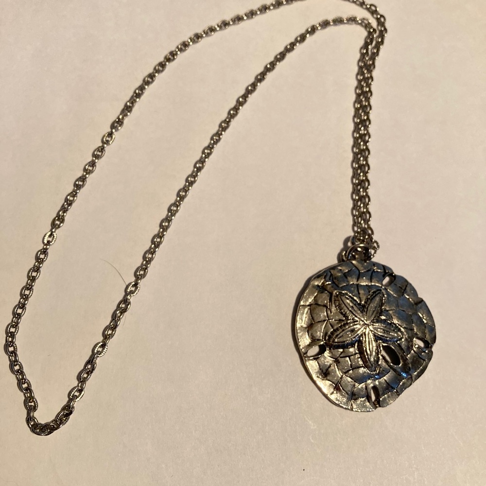 Silver sand dollar necklace